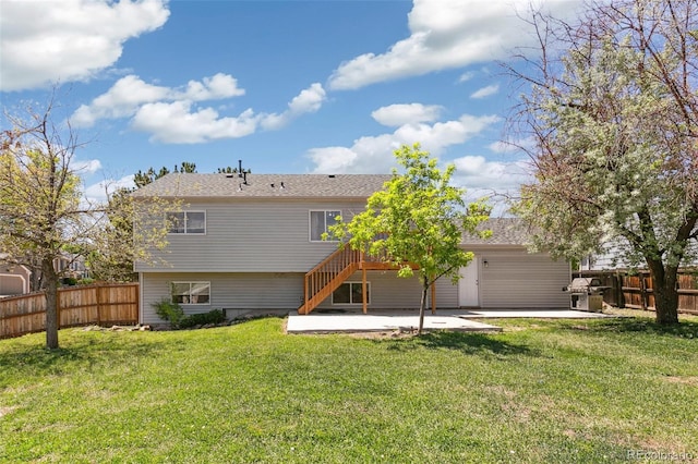 5886 S Nepal Way, Centennial, CO 80015 - back of property featuring a patio area, an attached garage, and stairs