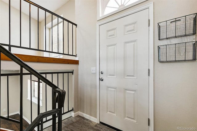 5886 S Nepal Way, Centennial, CO 80015 - foyer with dark wood-style floors, baseboards, and stairway