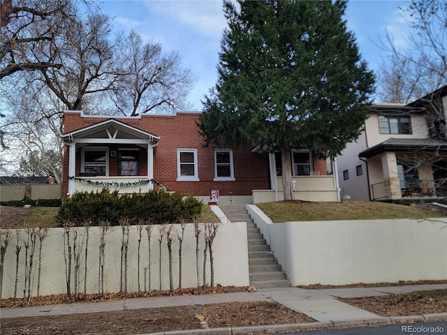 view of front of property with brick siding