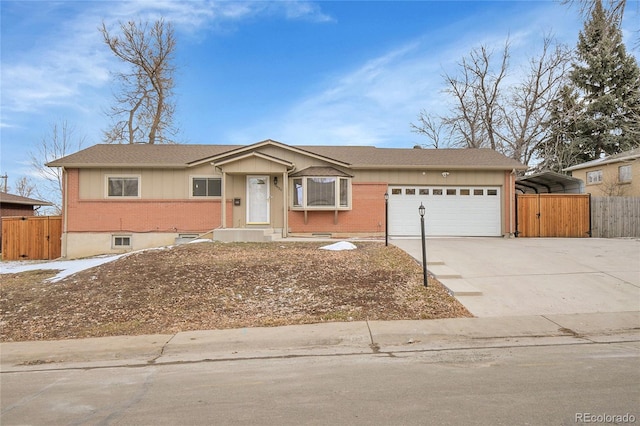 ranch-style house with a carport and a garage