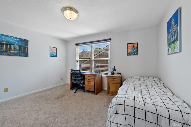 bedroom featuring light colored carpet