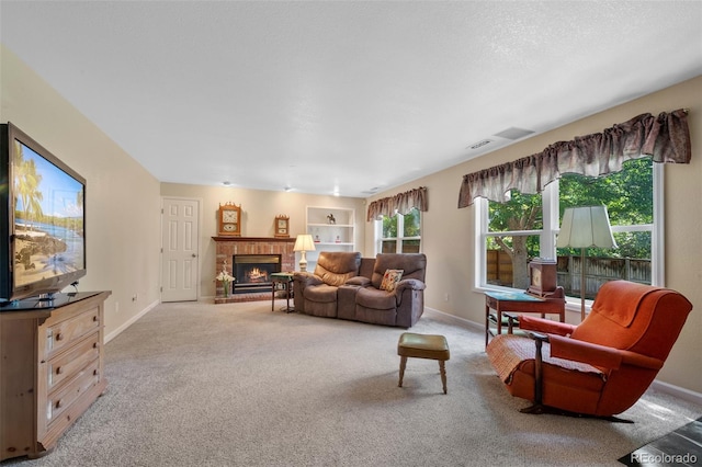 carpeted living room featuring a fireplace