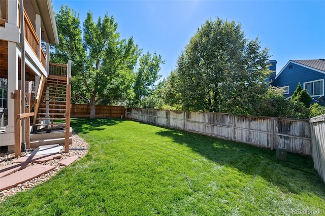 view of yard with a deck