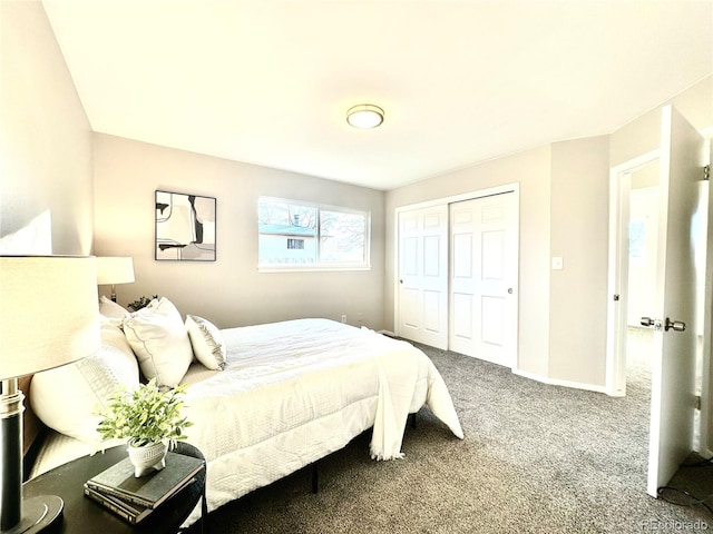 carpeted bedroom featuring a closet