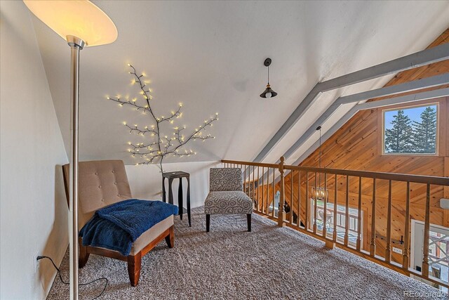 80 Castlewood Ct, Evergreen, CO 80439 - living area featuring plenty of natural light, wood walls, and carpet