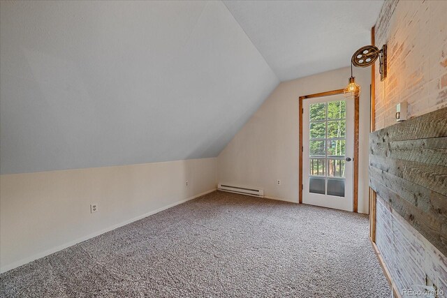 80 Castlewood Ct, Evergreen, CO 80439 - bonus room with baseboard heating, vaulted ceiling, carpet floors, and baseboards