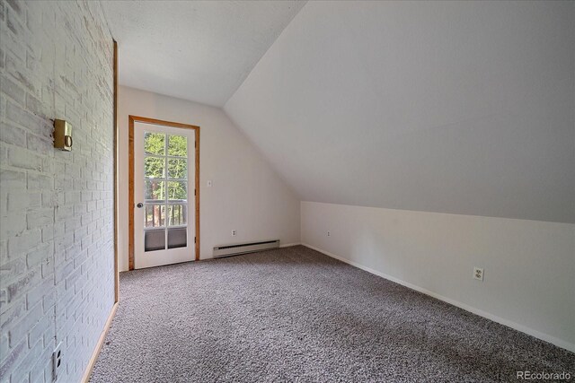 80 Castlewood Ct, Evergreen, CO 80439 - bonus room featuring baseboard heating, vaulted ceiling, carpet flooring, and baseboards