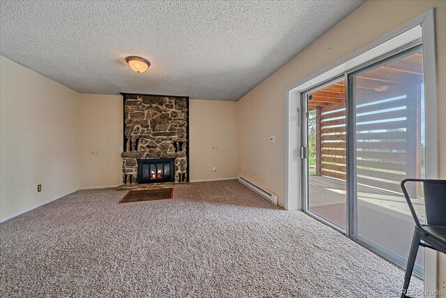 80 Castlewood Ct, Evergreen, CO 80439 - unfurnished living room with a baseboard radiator, a textured ceiling, carpet, a fireplace, and baseboards