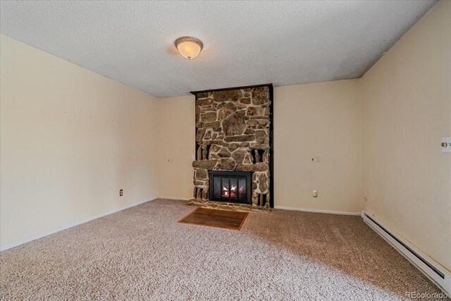 80 Castlewood Ct, Evergreen, CO 80439 - unfurnished living room featuring baseboard heating, carpet, a fireplace, a textured ceiling, and baseboards