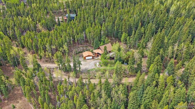 80 Castlewood Ct, Evergreen, CO 80439 - aerial overview of property's location featuring a heavily wooded area