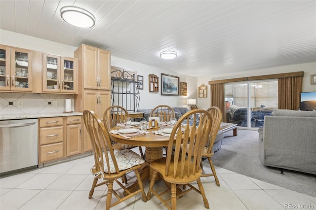 625 S Clinton St Unit 7A, Denver, CO 80247 - dining room featuring light tile patterned floors