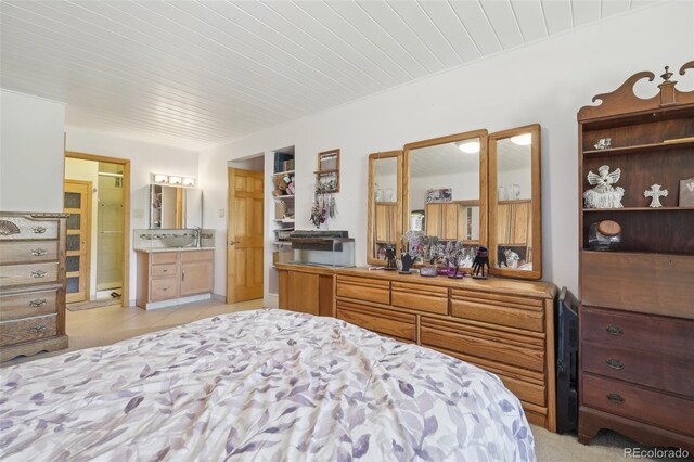 625 S Clinton St Unit 7A, Denver, CO 80247 - bedroom featuring wood ceiling and light tile patterned floors