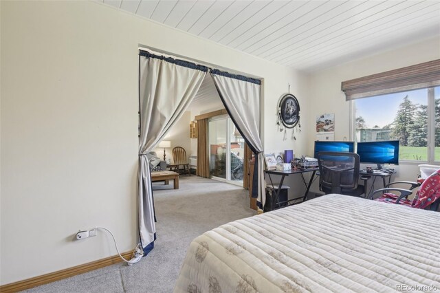 625 S Clinton St Unit 7A, Denver, CO 80247 - carpeted bedroom with wood ceiling