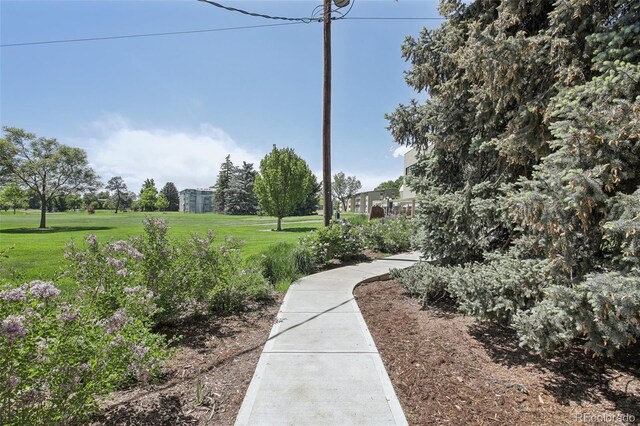 625 S Clinton St Unit 7A, Denver, CO 80247 - view of property's community with a lawn