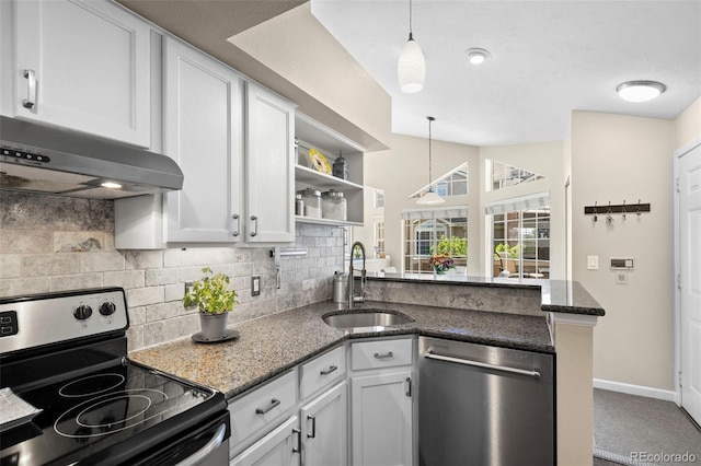 kitchen featuring appliances with stainless steel finishes, a sink, under cabinet range hood, a peninsula, and open shelves