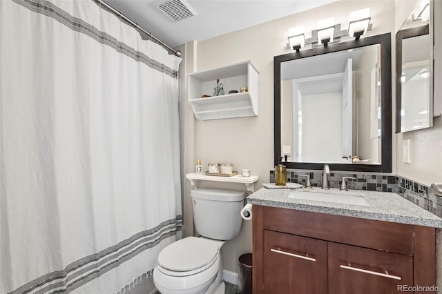 full bath featuring toilet, vanity, and decorative backsplash