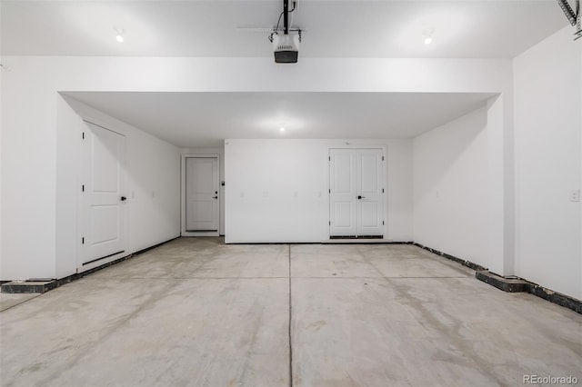 garage featuring a garage door opener