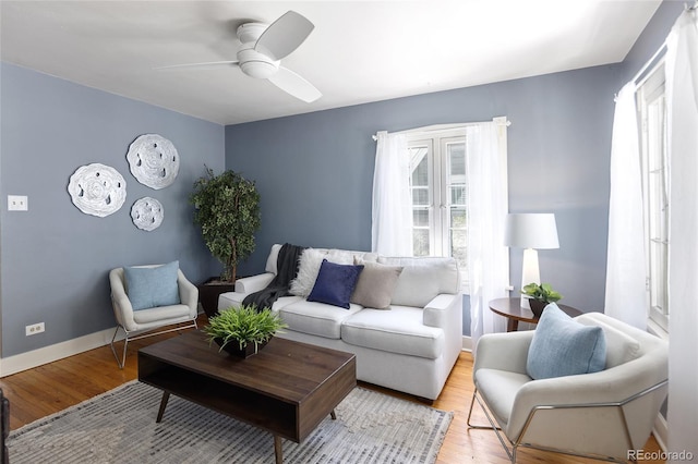 1838 S Williams St, Denver, CO 80210 - living area featuring a ceiling fan and light wood finished floors