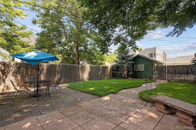1838 S Williams St, Denver, CO 80210 - fenced backyard featuring a patio area and outdoor dining area