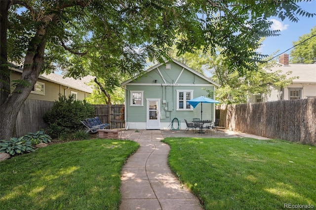 1838 S Williams St, Denver, CO 80210 - view of front facade with a fenced backyard and a patio area