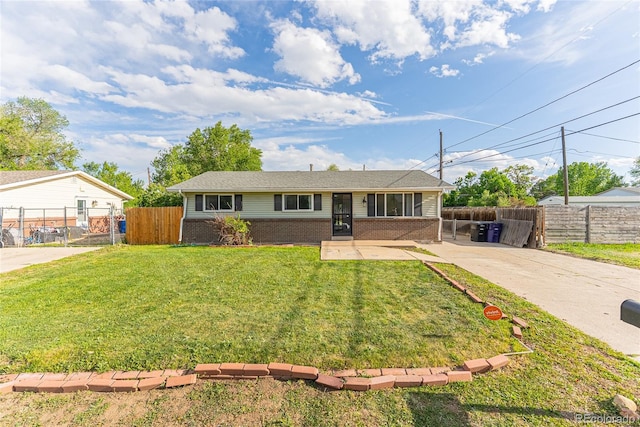 2630 W Asbury Ave, Denver, CO 80219 - single story home featuring brick siding