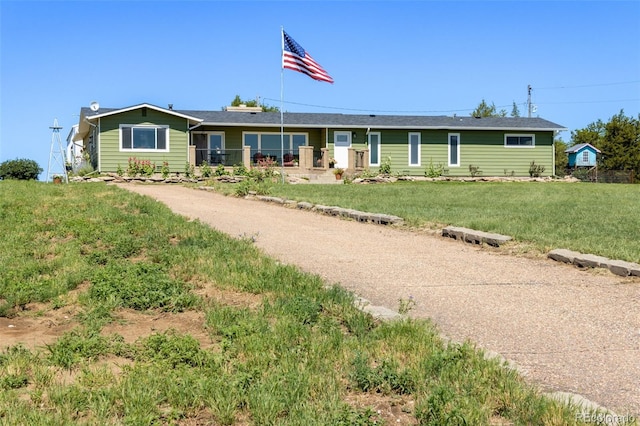 12891 County Road 29, Sterling, CO 80751 - single story home featuring a front lawn