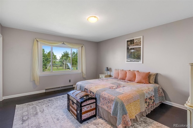 12891 County Road 29, Sterling, CO 80751 - bedroom with baseboard heating and baseboards