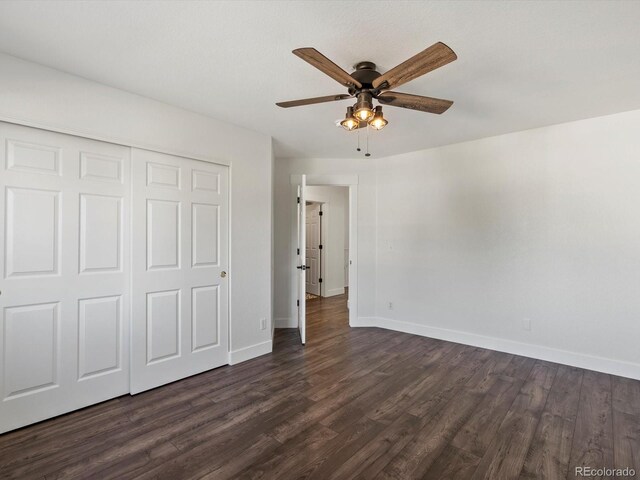 12695 Wolff St, Broomfield, CO 80020 - unfurnished bedroom with dark wood-type flooring, a closet, and ceiling fan