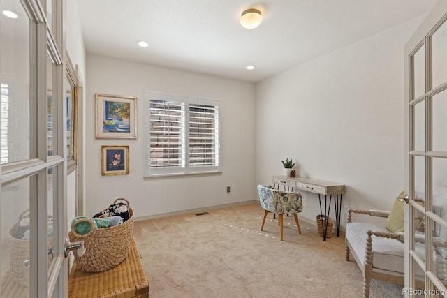 carpeted office space with recessed lighting, french doors, visible vents, and baseboards