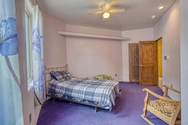 bedroom with ceiling fan and carpet floors