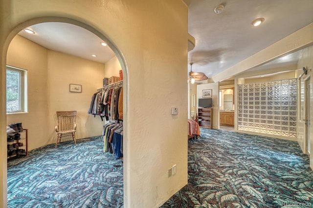 corridor featuring carpet flooring