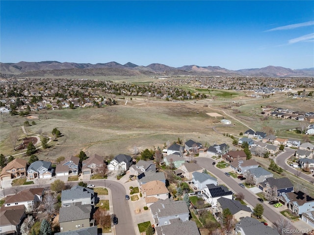 drone / aerial view with a mountain view and a residential view