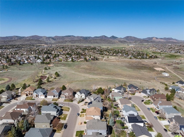 aerial view with a mountain view and a residential view