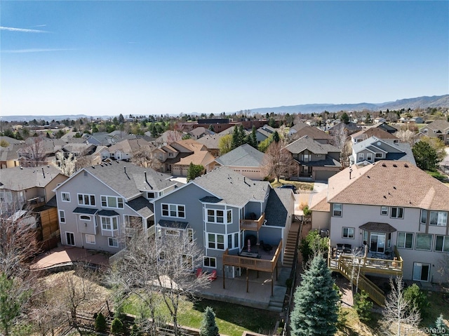 birds eye view of property with a residential view