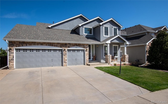 craftsman inspired home featuring a garage, stucco siding, a front yard, stone siding, and driveway