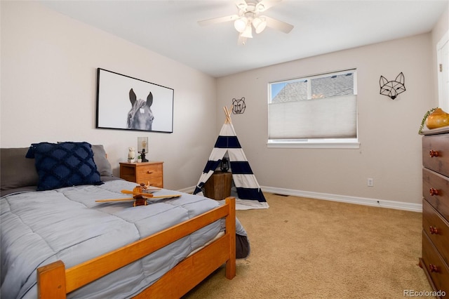 bedroom with ceiling fan, visible vents, baseboards, and carpet