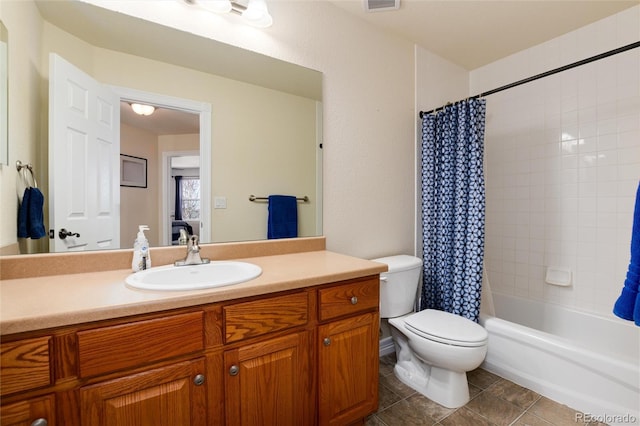 bathroom featuring vanity, shower / tub combo with curtain, tile patterned flooring, toilet, and visible vents