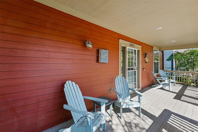 2853 Yosemite St, Denver, CO 80238 - wooden terrace with covered porch