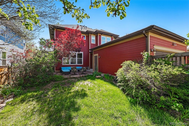 2853 Yosemite St, Denver, CO 80238 - back of property with a patio area and a garage