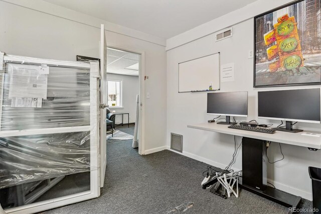 1050 S Quitman St, Denver, CO 80219 - office area with baseboards, dark colored carpet, and visible vents