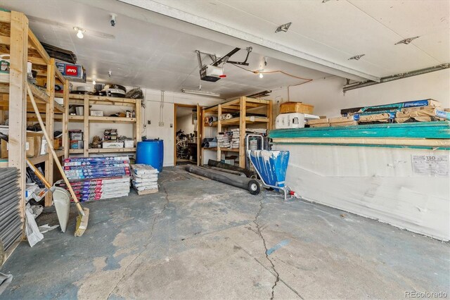1050 S Quitman St, Denver, CO 80219 - garage featuring a garage door opener