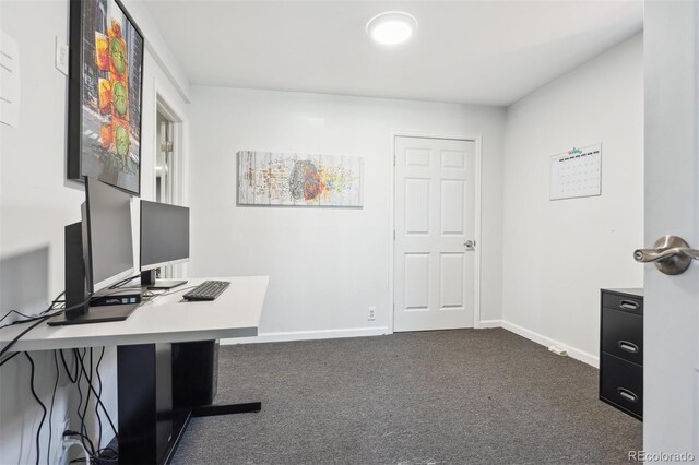 1050 S Quitman St, Denver, CO 80219 - carpeted home office featuring baseboards