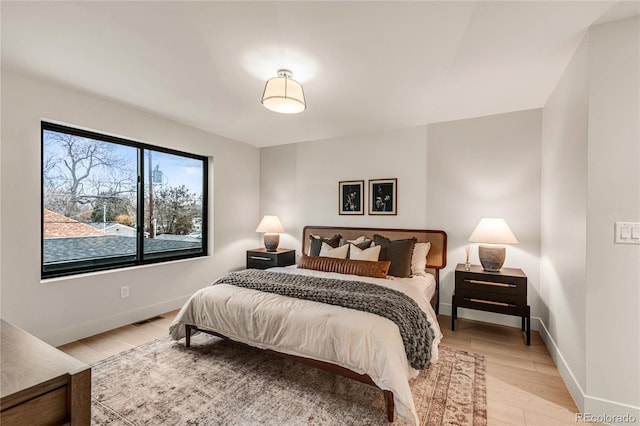 bedroom featuring light wood-type flooring