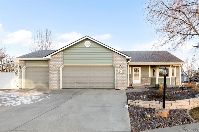 ranch-style house featuring a garage