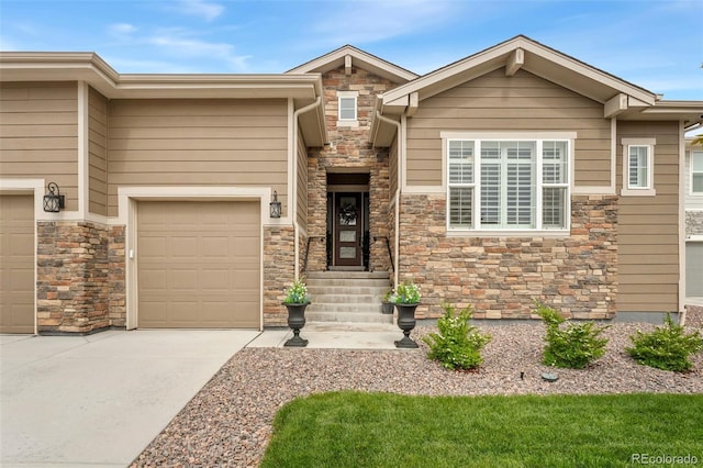228 Rogers Ct, Castle Rock, CO 80104 - view of front of home with stone siding and driveway