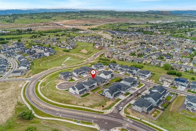 228 Rogers Ct, Castle Rock, CO 80104 - aerial view of property's location featuring a mountainous background and nearby suburban area