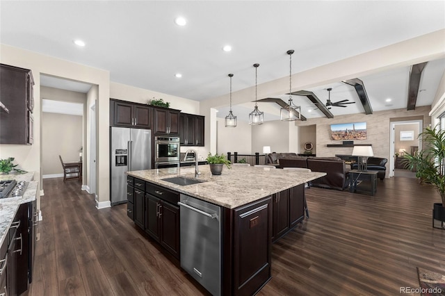228 Rogers Ct, Castle Rock, CO 80104 - kitchen with appliances with stainless steel finishes, a sink, a ceiling fan, dark wood-type flooring, and recessed lighting