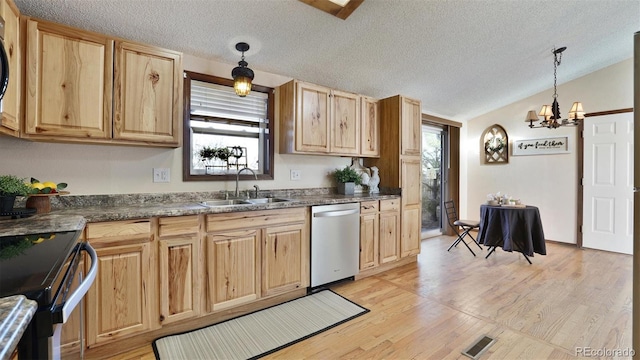 kitchen with lofted ceiling, sink, decorative light fixtures, light wood-type flooring, and dishwasher