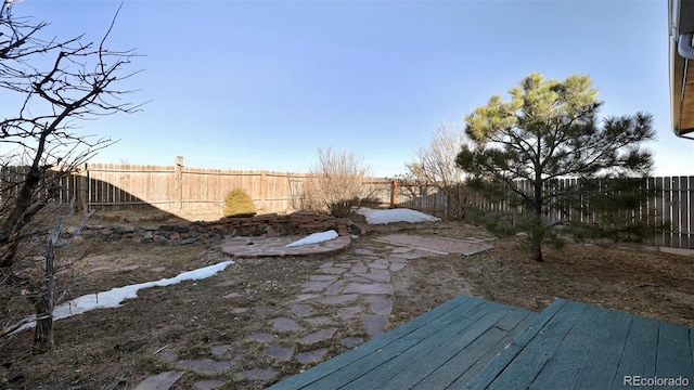 view of yard with a wooden deck