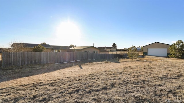 view of yard featuring a garage